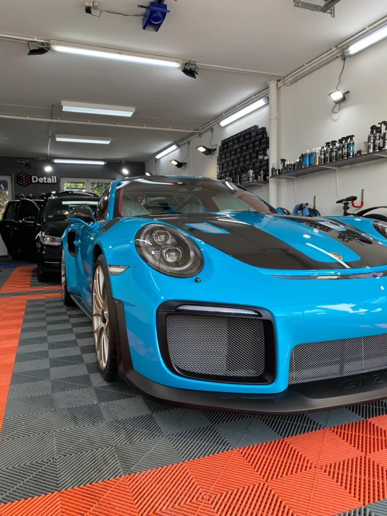 leasingrückgabe aufbereitung Porshe Blau